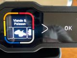 a close up of a smart device on a table