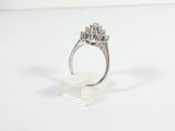 an image of a diamond ring on a white surface