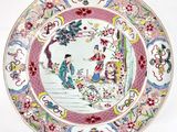 a plate with a picture of a woman and a child on it