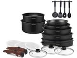 a group of black pots and pans sitting on top of each other