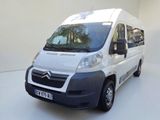 a white van that is parked in a room