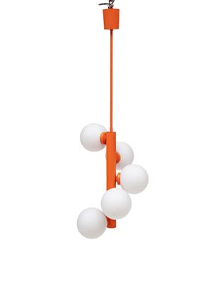 an orange and white chandelier with five white balls hanging from it