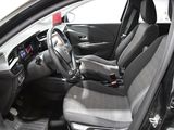 the interior of a car with the front seats folded down