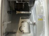an image of a machine that is in the process of being repaired
