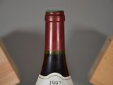 a bottle of wine that is sitting on a table