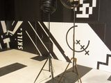 a black and white room with a black and white checkered floor and a black and white wall