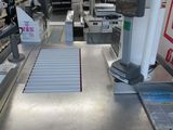 an image of a checkout counter in a grocery store