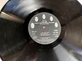 an old record with a picture of the beatles on it