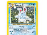 a close up of a pokemon card on a white surface