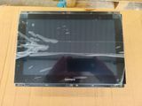 a person holding a tablet computer on a table