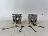 pair of antique silverplated tea cups and spoons
