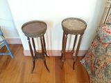 two tables that are sitting on the floor next to each other