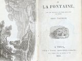 an open book with a picture of a man and a dog on it