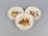 three plates with a picture of a horse drawn carriage on them