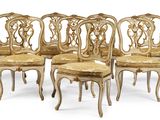six antique chairs with gold upholstered seats and a gold upholstered seat