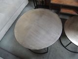 two tables that are sitting next to each other on the floor