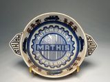 an image of a blue and white bowl with a design on it