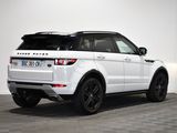 a picture of a white range rover parked in a garage
