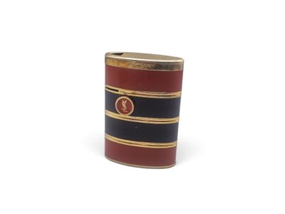 an image of a red and black canister with a gold stripe on it