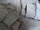 a close up of a jacket with a zipper on it