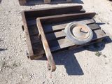 two wooden pallets that have wheels on them