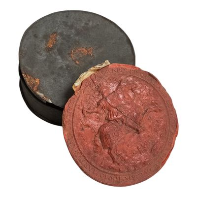 une image représentant un cachet de cire rouge orné d'un cheval