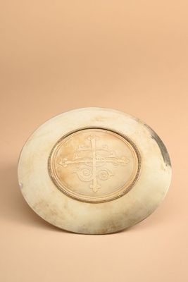 an image of a white plate with a cross on it