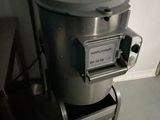 a machine that is sitting on a stand in a room