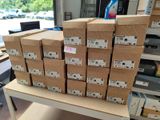 a lot of boxes that are stacked up on a table
