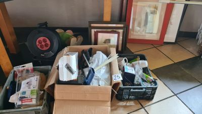 a box full of items sitting on the floor in a room