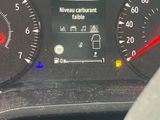 a close up of a car dashboard with a speedometer