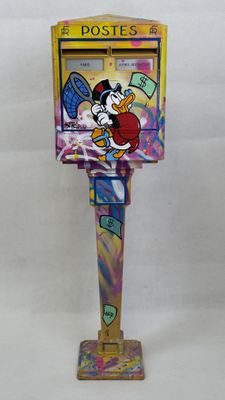 an image of a toy toilet with a cartoon character on it