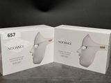 two boxes of noosance products on a table with a black background