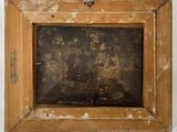 an old wooden picture frame with peeling paint on it