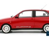 the red car is parked on a white surface with a white background
