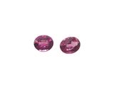 a pair of pink tourmaline gems on a white background