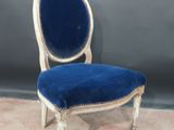 an image of a blue and white chair with a blue seat