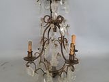 an image of a chandelier with crystal beads hanging from it ' s arms