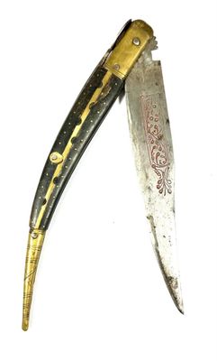a knife that is laying on top of a table