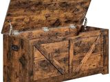 an image of a wooden chest with a sliding door on it