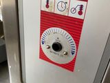 a close up of a button on a machine