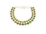 a close up of a necklace on a white background