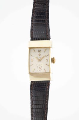 a close up of a wrist watch on a white background