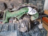 a green corded drill with a number on it