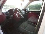 a view of the inside of a car from the driver ' s seat