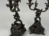 pair of antique silver plated candlesticks with birds and flowers