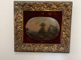 a picture of a painting hanging on a wall in a room
