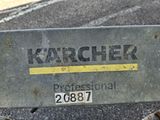 a sign that says karcher professional on the side of the road