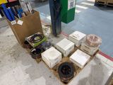 many boxes of electrical equipment on the floor in the store