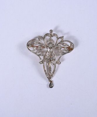 une image représentant une broche en forme de diamant sur fond blanc